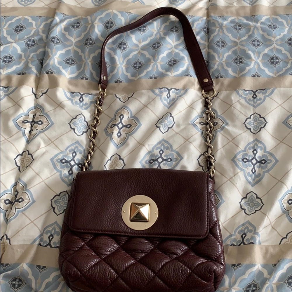 Maroon leather Kate Spade purse.